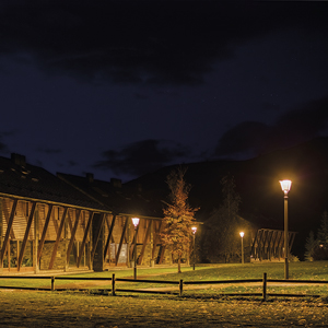 Villa XLA luminaires alongside classic pitched-roof buildings, preserving the traditional aesthetics of the Pyrenees.